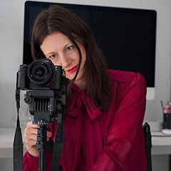 Emily Quattrocchi looking through her camera