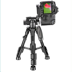 Image of table top tripod with camera mounted on angle